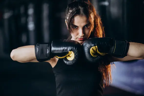 young woman boxer training at the gym 1